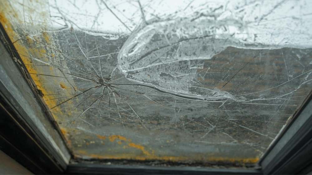 Severely cracked skylight glass in Brooklyn, NYC exposing the interior to leaks – Common Skylight Problems requiring replacement.